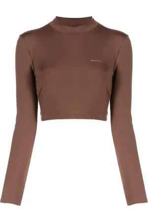 MATÉRIEL by Aleksandre Akhalkatsishvili Top con cuello vuelto y logo laminado