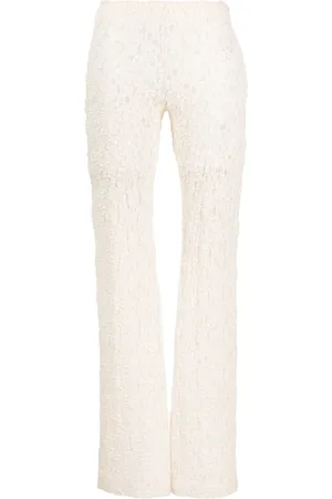Chloé Pantalones bootcut con encaje floral