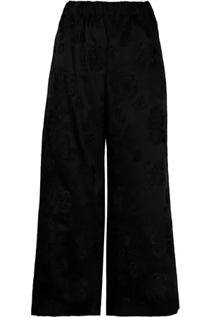 Comme des Garçons Pantalones capri con motivo floral
