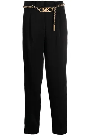 Michael Kors Pantalones con tiro alto con placa del logo
