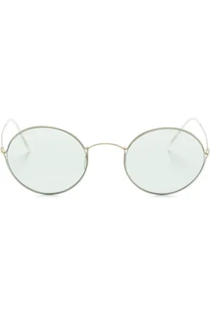 Giorgio Armani Lentes de sol con armazón redonda y micas oscuras