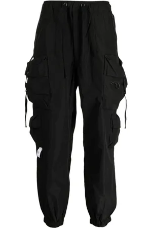 Musium Div. Pantalones drop crotch con bolsillos