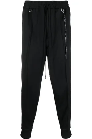 MASTERMIND JAPAN Pants tapered con motivo de calaveras