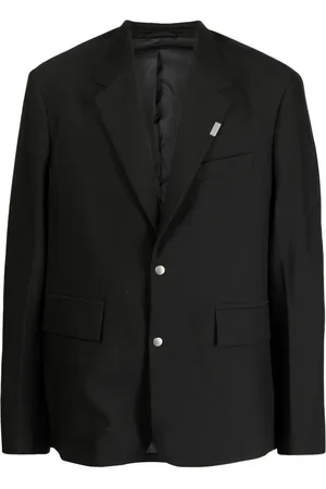 Izzue Blazer con botones y placa del logo