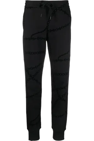 VERSACE Pants con cadenas estampadas