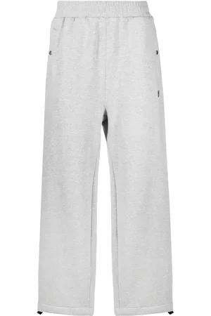 Izzue Pants con parche del logo