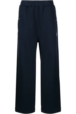 Izzue Pants con parche del logo