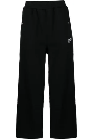 Izzue Pants con parche del logo