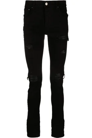 AMIRI Skinny jeans MX1 con efecto envejecido