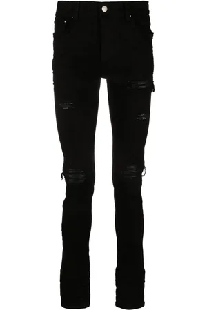 AMIRI Skinny jeans MX1 con efecto envejecido
