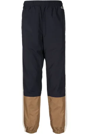 Lacoste Pants con logo bordado y diseño color block