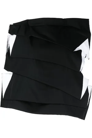 Comme des Garçons Chamarra asimétrica con efecto envejecido
