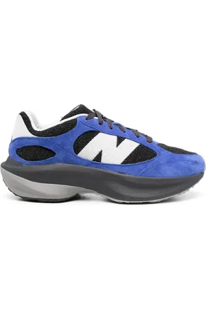 New Balance Tenis Warped Runner con paneles