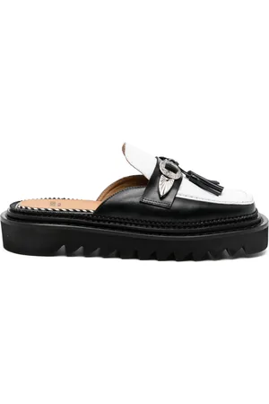 TOGA PULLA Mules con detalle de borlas