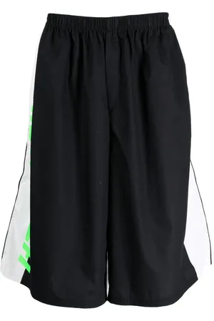 Haider Ackermann Shorts deportivos con logo estampado