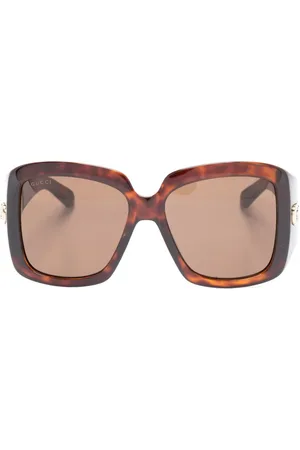 Gucci Lentes de sol con armazón oversize estilo carey