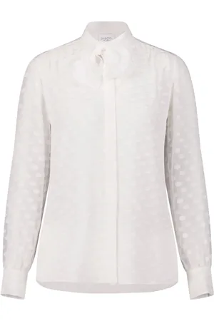 Giambattista Valli Blusa transparente con lunares estampados