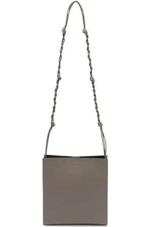 Jil Sander Bolsa de hombro con logo en relieve y tira trenzada