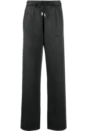 OFF-WHITE Pants con detalles de ojales