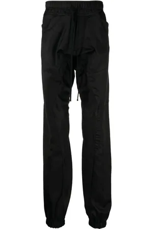 JULIUS Pantalones skinny con cordones en la pretina