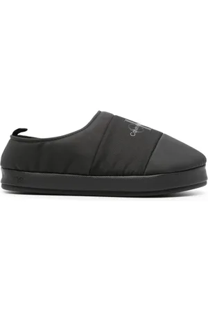 Calvin Klein Slippers capitonados con logo