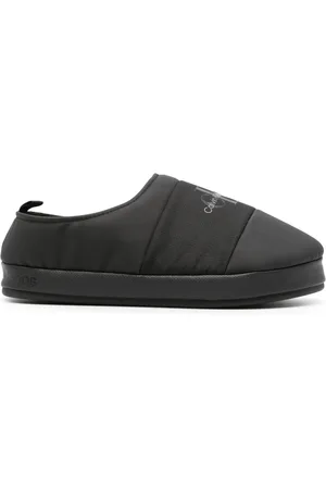 Calvin Klein Slippers capitonados con logo