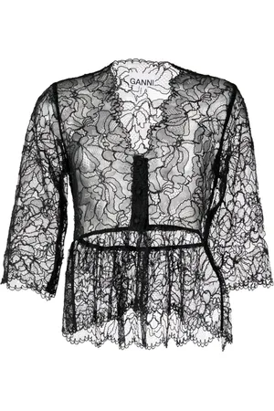 Ganni Top con diseño transparente y encaje floral