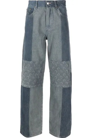 Marine Serre Jeans anchos con lunas crecientes estampadas