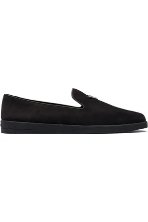 Prada Mocasines con placa del logo