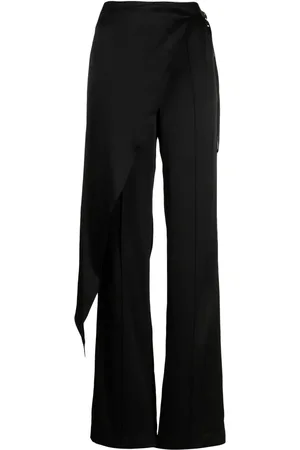 MATÉRIEL by Aleksandre Akhalkatsishvili Pantalones con pinzas y detalle de mascada