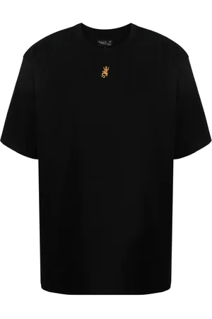 AGNÈS B. Playera con lagarto bordado