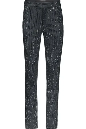 AREA Pantalones con detalles de cristal