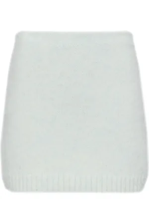 Prada Falda corta con logo triangular