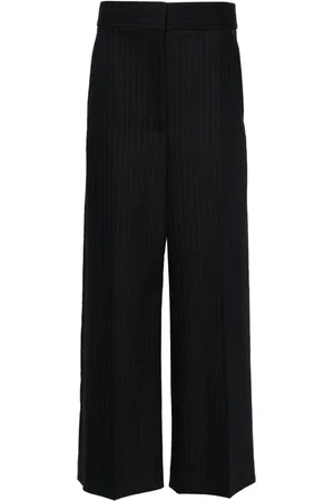 Khaite Pantalones anchos con tiro alto