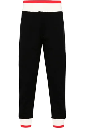Alexander McQueen Pants con logo estampado