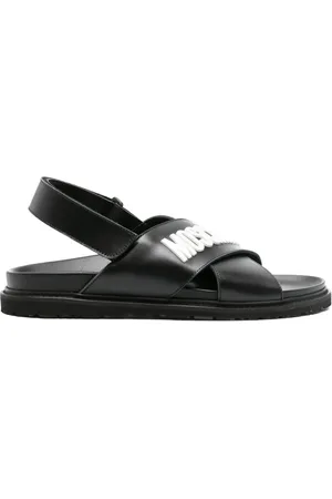 Moschino Sandalias con tiras cruzadas y placa del logo