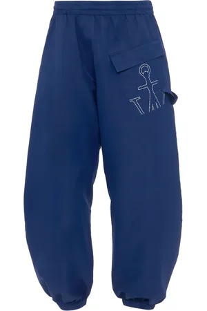 J.W.Anderson Pants Twisted con logo estampado