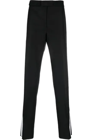 Alexander McQueen Pantalones de vestir con rayas estampadas