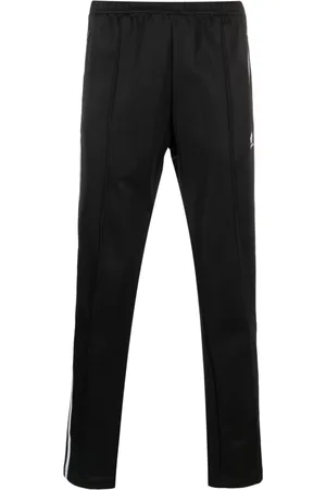 Pantalones adidas tres online rayas hombre