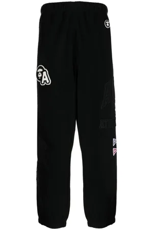 A Bathing Ape Pants con aplique del logo