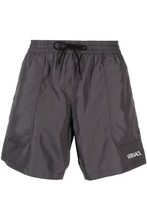 VERSACE Shorts de playa con estampado Barocco