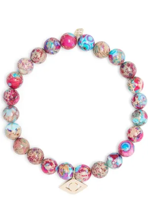 Sydney Evan Pulsera en oro amarillo de 14kt con dije Evil Eye y cuentas