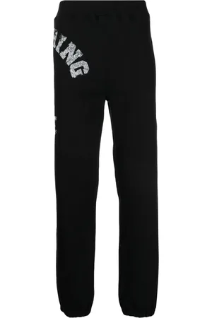 A Bathing Ape Pants con logo estampado
