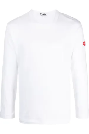 Comme des Garçons Playera con aplique pixelado de COMME DES GARÇONS PLAY x the Artist Invader