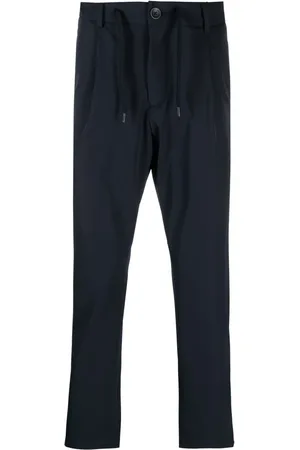 HERNO Pantalones tapered con placa del logo