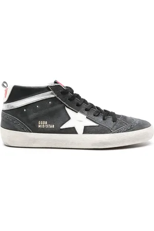 Golden Goose Tenis de gamuza Mid Star con aplique del logo