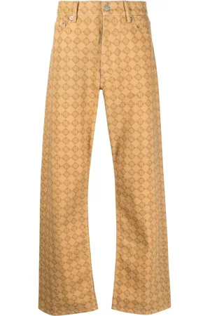 Nanushka Pantalones rectos con monograma estampado