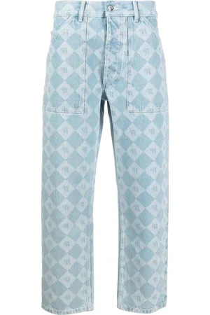 Nanushka Jeans capri con logo estampado
