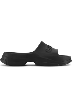 Ganni Flip flops con logo en relieve y suela gruesa