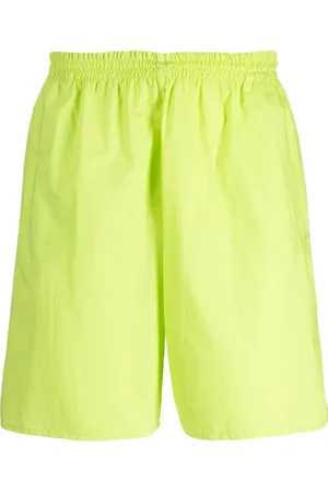 Maison Margiela Shorts con pretina elástica y números bordados